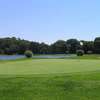 A view from the 6th green protected by sand bunkers and one of the three lakes at Crooked Tree Golf Course